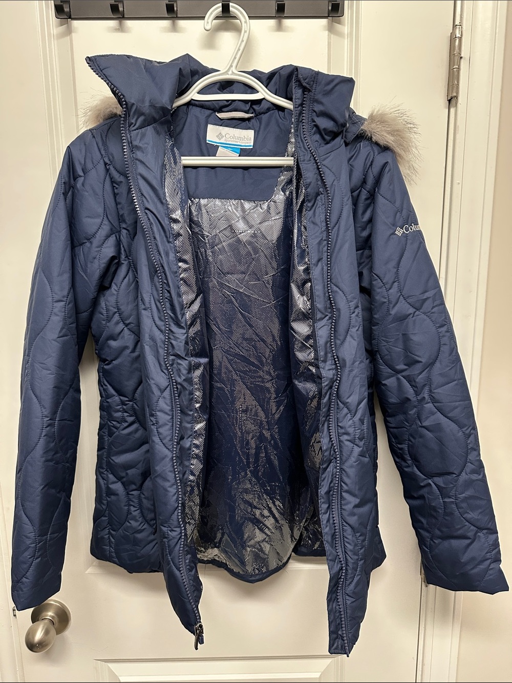 Woman’s Columbia Navy Quilted Jacket with Hood and Faux Fur Trim